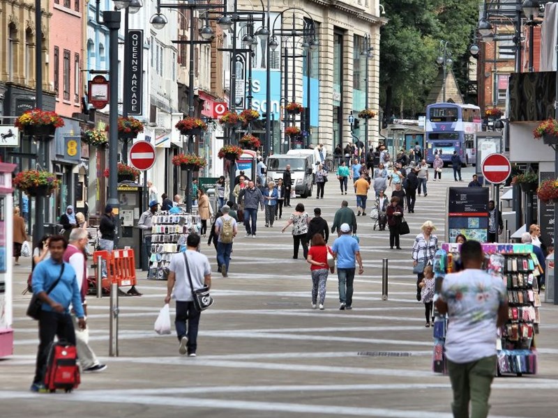 Looking up a busy, pedestrianised high street